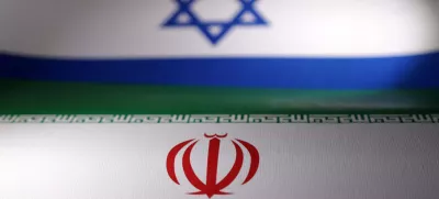 FILE PHOTO: Israeli and Iranian flags are seen in this illustration taken, April 24, 2024. REUTERS/Dado Ruvic/Illustration/File Photo