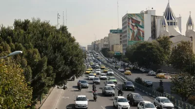 Cars pass on a street after several explosions were heard, in Tehran, Iran, October 26, 2024. Majid Asgaripour/WANA (West Asia News Agency) via REUTERS ATTENTION EDITORS - THIS IMAGE HAS BEEN SUPPLIED BY A THIRD PARTY