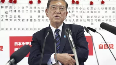 Japan's Prime Minister and president of the Liberal Democratic Party (LDP) Shigeru Ishiba speaks to the media regarding the early result of lower house election, at the LDP headquarters Sunday, Oct. 27, 2024, in Tokyo, (Kyodo News via AP)