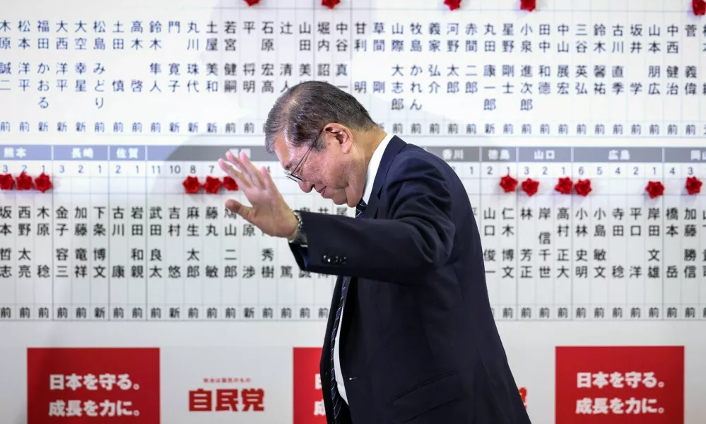 Japan's Prime Minister Shigeru Ishiba leaves after speaking to the media at the Liberal Democratic Party's (LDP) headquarters on October 27, 2024, in Tokyo, Japan. Takashi Aoyama/Pool via REUTERS