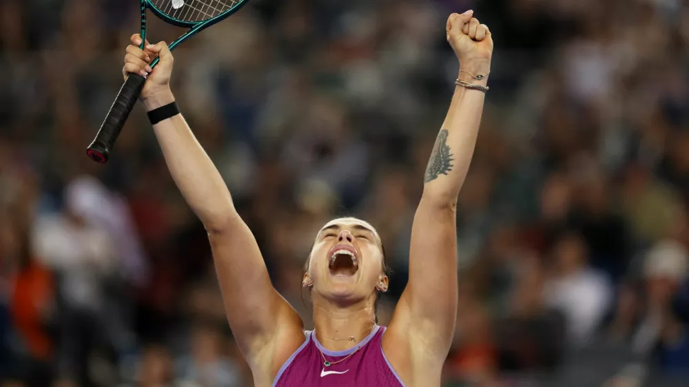 Tennis - Wuhan Open - Optics Valley International Tennis Center, Wuhan, China - October 13, 2024 Belarus' Aryna Sabalenka celebrates winning her final match against China's Qinwen Zheng REUTERS/Florence Lo   TPX IMAGES OF THE DAY