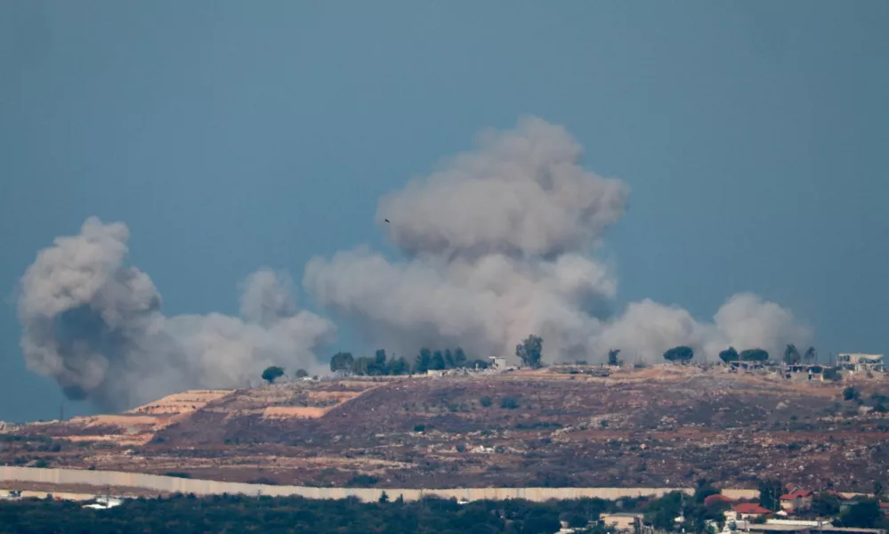 Smoke billows over southern Lebanon, amid ongoing hostilities between Hezbollah and Israeli forces, as seen from northern Israel, October 28, 2024. REUTERS/Gonzalo Fuentes   TPX IMAGES OF THE DAY