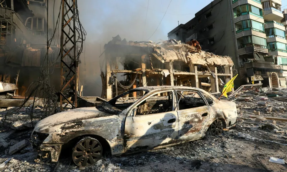 The wreckage of a vehicle is seen at a damaged site in the aftermath of Israeli strikes on Beirut's southern suburbs, amid the ongoing hostilities between Hezbollah and Israeli forces, Lebanon, October 27, 2024. REUTERS/Mohammed Yassin