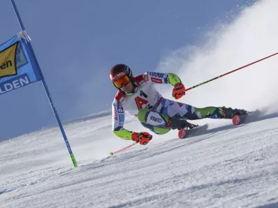 Slovenia's Zan Kranjec speeds down the course during an alpine ski, men's World Cup giant slalom, in Soelden, Austria, Sunday, Oct. 27, 2024. (AP Photo/Marco Trovati)