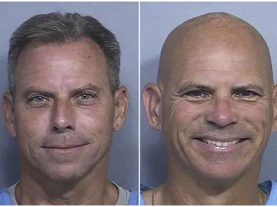 This combination of two booking photos provided by the California Department of Corrections shows Erik Menendez, left, and Lyle Menendez. (California Dept. of Corrections via AP)