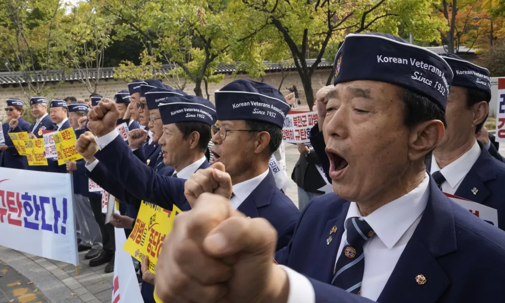 Members of the Korean Veterans Association stage a rally against a recent deployment of North Korean troops to Russia, near the Russian Embassy in Seoul, South Korea, Monday, Oct. 28, 2024. (AP Photo/Ahn Young-joon)