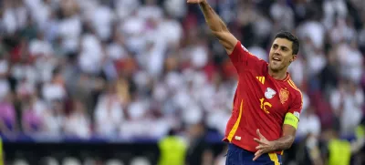 FILE - Spain's Rodri celebrates after a quarterfinal match between Germany and Spain at the Euro 2024 soccer tournament in Stuttgart, Germany, Friday, July 5, 2024. (AP Photo/Antonio Calanni, File)