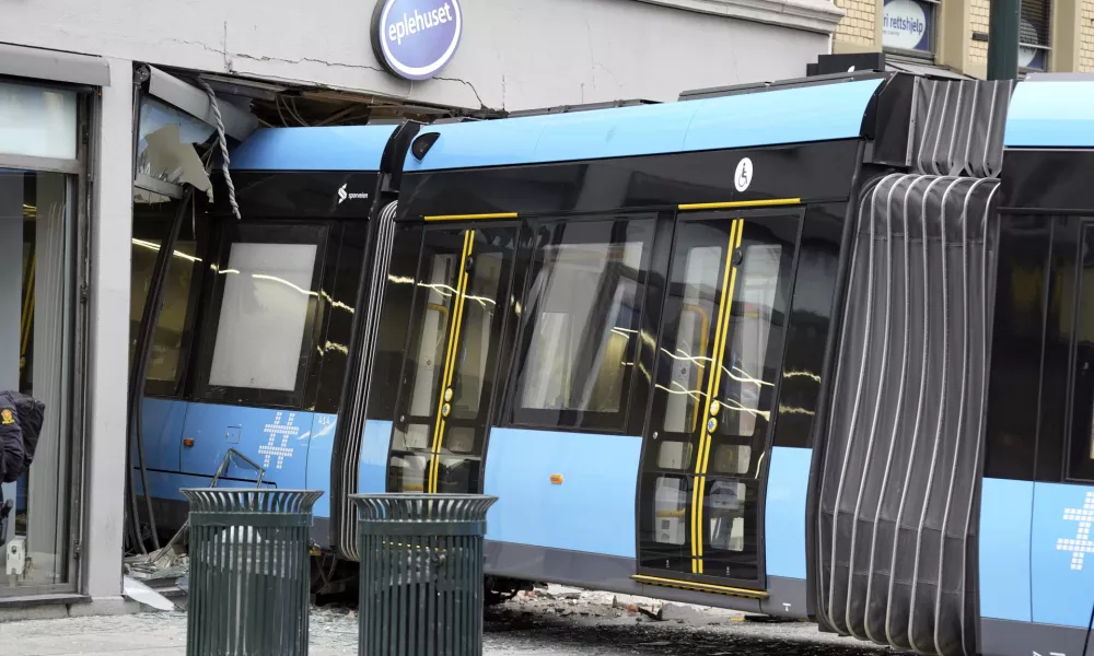 A derailed tram that crashed into a building in downtown Oslo, Norway, Tuesday Oct. 29, 2024. (Terje Pedersen/NTB Scanpix via AP)