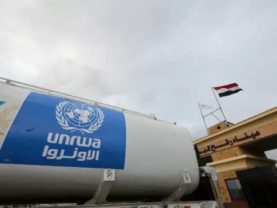 FILE PHOTO: A truck, marked with United Nations Relief and Works Agency (UNRWA) logo, crosses into Egypt from Gaza, at the Rafah border crossing between Egypt and the Gaza Strip, during a temporary truce between Hamas and Israel, in Rafah, Egypt, November 27, 2023. REUTERS/Amr Abdallah Dalsh/File Photo