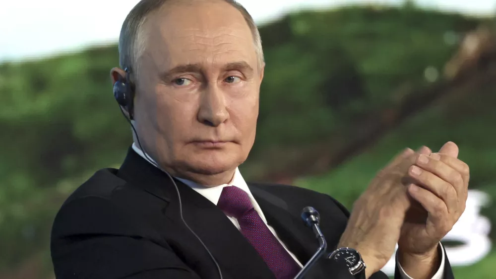 FILE - Russian President Vladimir Putin applauds during the Eastern Economic Forum in Vladivostok, Russia, on Sept. 5, 2024. (Vyacheslav Prokofyev, Sputnik, Kremlin Pool Photo via AP, File)