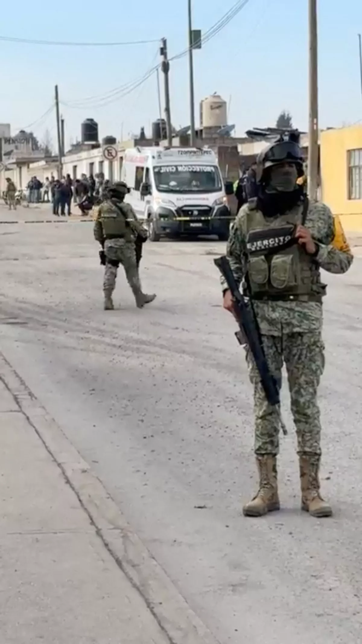 A member of the Mexican Army stands on a street near an ambulance, after an explosion at a Simec-owned steel plant in Mexico's central Tlaxcala state, at San Cosme Xaloztoc, Tlaxcala state, Mexico, October 30, 2024, in this screengrab from a handout video. PRENSA DE TLAXCALA/Handout via REUTERS. THIS IMAGE HAS BEEN SUPPLIED BY A THIRD PARTY.NO RESALES. NO ARCHIVES. MANDATORY CREDIT