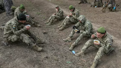 New recruits of the 126th Territorial Defence Brigade of the Ukrainian Armed Forces have lunch between military exercises at a training ground, amid Russia's attack on Ukraine, in an undisclosed location in southern Ukraine October 29, 2024. REUTERS/Ivan Antypenko