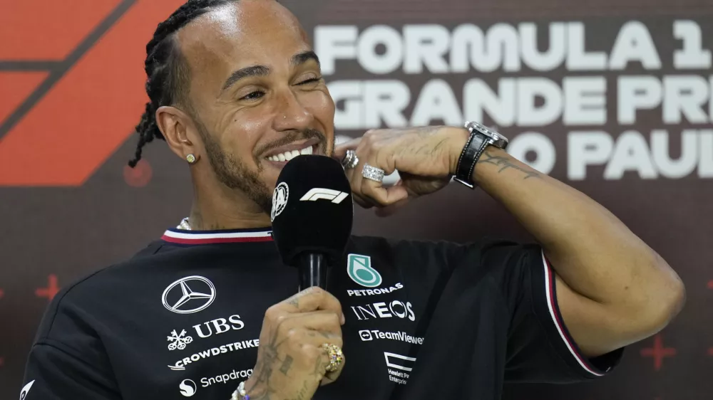 Mercedes driver Lewis Hamilton, of Britain, smiles during a press conference ahead of the Brazilian Formula One Grand Prix at the Interlagos race track in Sao Paulo, Brazil, Thursday, Oct. 31, 2024. (AP Photo/Andre Penner)