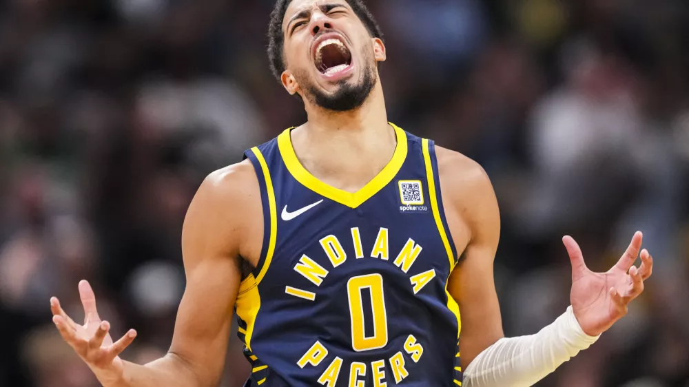 Oct 30, 2024; Indianapolis, Indiana, USA; Indiana Pacers guard Tyrese Haliburton (0) reacts to after scoring a three point basket during a game against the Boston Celticss at Gainbridge Fieldhouse. Mandatory Credit: Grace Smith-Imagn Images