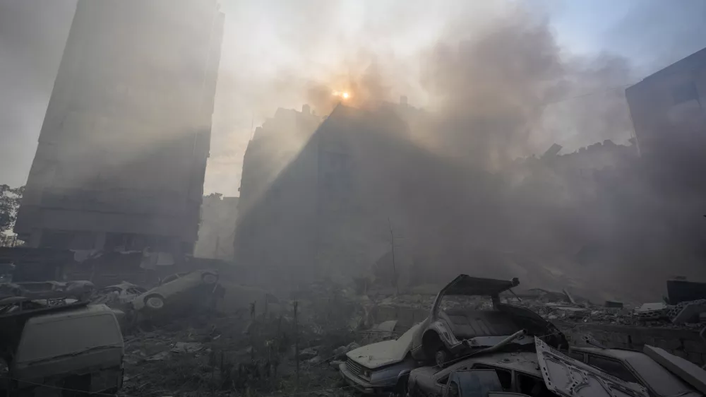 Smoke rises from the site of an Israeli airstrike in Dahiyeh, Beirut, Lebanon, Friday, Nov. 1, 2024. (AP Photo/Hassan Ammar)