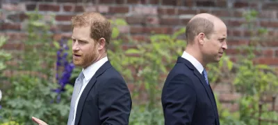 FILE - Prince Harry, left, and Prince William stand together during the unveiling of a statue they commissioned of their mother Princess Diana, on what would have been her 60th birthday, in the Sunken Garden at Kensington Palace, London, Thursday July 1, 2021. Prince Harry has said he wants to have his father and brother back and that he wants "a family, not an institution," during a TV interview ahead of the publication of his memoir. The interview with Britain's ITV channel is due to be released this Sunday. (Dominic Lipinski /Pool Photo via AP, File)