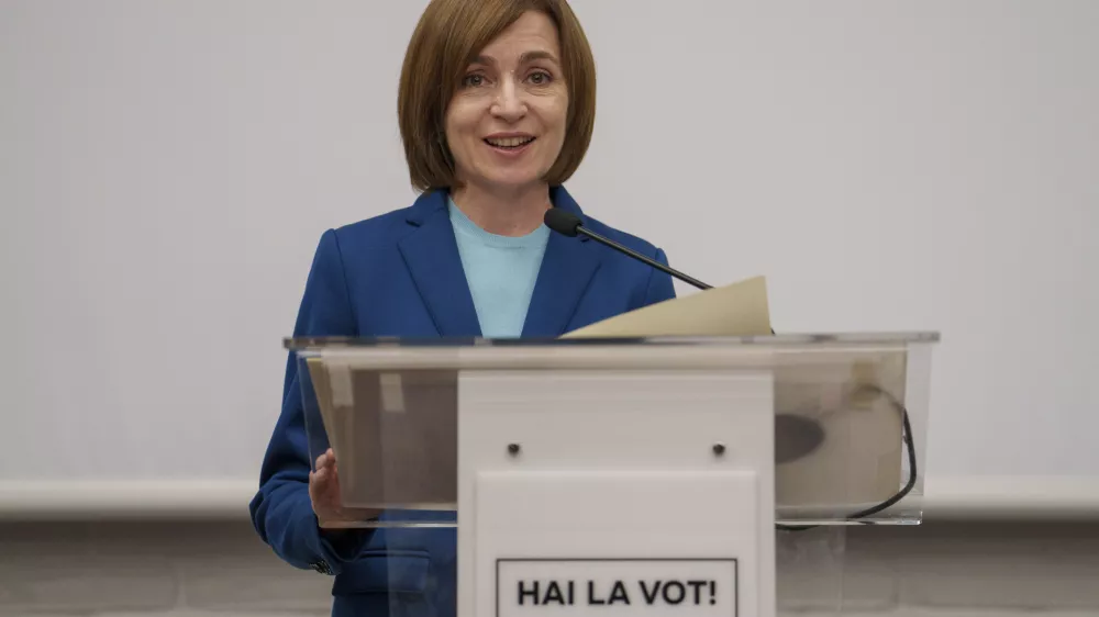 Moldova's President Maia Sandu delivers a statement after winning a second term in a pivotal presidential runoff against a Russia-friendly opponent in Chisinau, Moldova, early Monday, Nov. 4, 2024. (AP Photo/Vadim Ghirda)