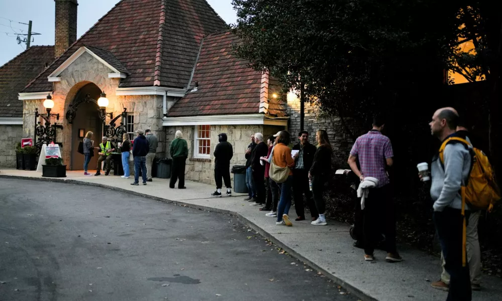 People line up to vote in the 2024 U.S. presidential election on Election Day at Park Tavern in Atlanta, Georgia, U.S., November 5, 2024. REUTERS/Cheney Orr