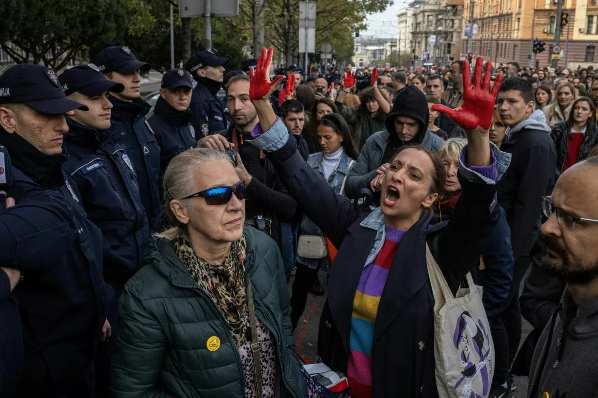 Members of police stand guard as demonstrators protest to commemorate an accident at a railway station in the Serbian city of Novi Sad, for which they blame negligence and corruption by the authorities, in front of the government in Belgrade, Serbia November 3, 2024. REUTERS/Marko Djurica