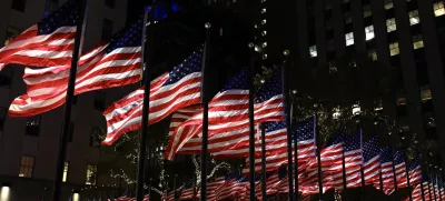 05 November 2024, US, New York: US flags decorate the Rockefeller plaza in Manhattan on the US Election Night. Photo: Apolline Guillerot-Malick/SOPA Images via ZUMA Press Wire/dpa