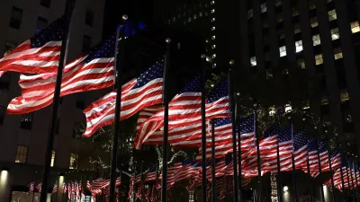 05 November 2024, US, New York: US flags decorate the Rockefeller plaza in Manhattan on the US Election Night. Photo: Apolline Guillerot-Malick/SOPA Images via ZUMA Press Wire/dpa