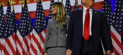 Republican presidential nominee and former U.S. President Donald Trump takes the stage with his wife Melania to address supporters at his rally, at the Palm Beach County Convention Center in West Palm Beach, Florida, U.S., November 6, 2024. REUTERS/Brian Snyder