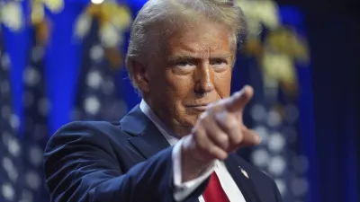 Republican presidential nominee former President Donald Trump arrives at an election night watch party at the Palm Beach Convention Center, Wednesday, Nov. 6, 2024, in West Palm Beach, Fla. (AP Photo/Evan Vucci)