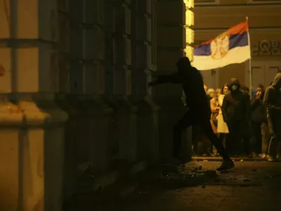 NOVI SAD, SERBIA - NOVEMBER 5: Some demonstrators spray red paint on the City Hall and damage it with sticks as thousands of people gather in Serbia's second-largest city of Novi Sad to protest following the concrete awning at a railway station collapsed last week, killing 14 people in Novi Sad, Serbia on November 05, 2024. Protesters demanded accountability from officials and sought to march to the train station but were stopped by police. Angry protesters later threw flares, red paint and wastewater at the City Hall. Filip Stevanovic / Anadolu/ABACAPRESS.COM,Image: 930955017, License: Rights-managed, Restrictions:, Model Release: no