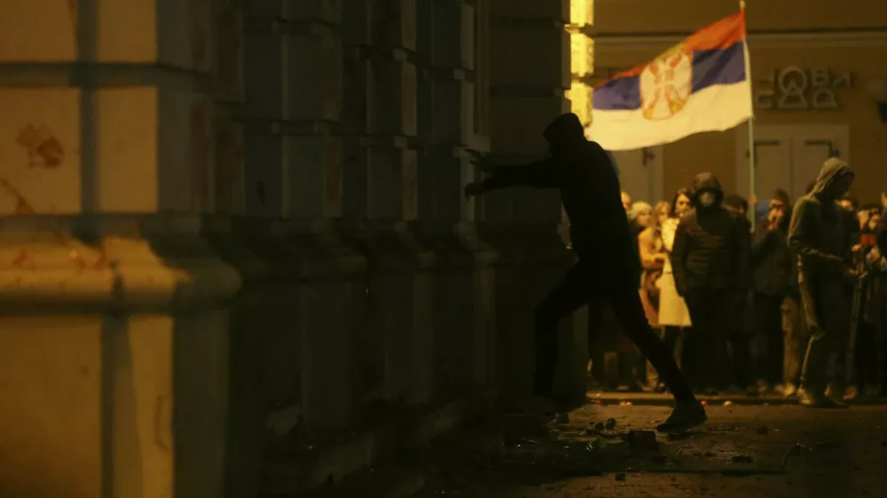 NOVI SAD, SERBIA - NOVEMBER 5: Some demonstrators spray red paint on the City Hall and damage it with sticks as thousands of people gather in Serbia's second-largest city of Novi Sad to protest following the concrete awning at a railway station collapsed last week, killing 14 people in Novi Sad, Serbia on November 05, 2024. Protesters demanded accountability from officials and sought to march to the train station but were stopped by police. Angry protesters later threw flares, red paint and wastewater at the City Hall. Filip Stevanovic / Anadolu/ABACAPRESS.COM,Image: 930955017, License: Rights-managed, Restrictions:, Model Release: no