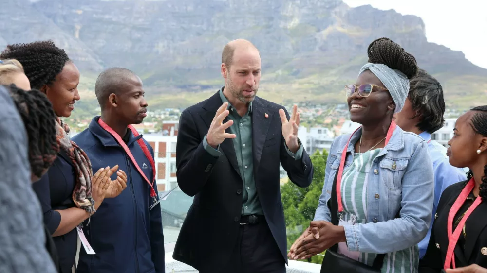 Prince William, Prince of Wales chats with young climate activists in front of the iconic Table Mountain at the Earthshot Prize Climate Leaders Youth Programme on November 04, 2024 in Cape Town, South Africa. During his visit, The Prince of Wales will attend the fourth annual Earthshot Prize Awards and engaged in various environmental initiatives and participated in events held in Cape Town as part of 'Earthshot Week'.The Earthshot Prize Climate Leaders Youth Programme. Prince William, Prince of Wales visit to Cape Town, South Africa - 04 Nov 2024As part of 'Earthshot Week' in South Africa, The Prince will take part in a series of events, spotlighting groundbreaking environmental solutions and bringing together world-leading innovators, investors and philanthropists to drive forward the restoration and protection of our planet.,Image: 930324103, License: Rights-managed, Restrictions:, Model Release: no