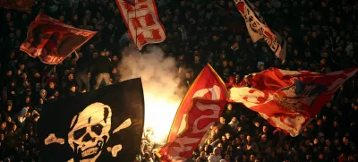 Soccer Football - Champions League - Crvena Zvezda v FC Barcelona - Rajko Mitic Stadium, Belgrade, Serbia - November 6, 2024 General view of Crvena Zvezda fans with flares in the stands REUTERS/Marko Djurica