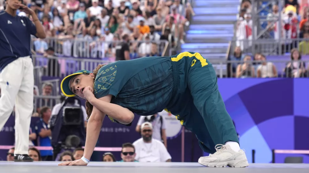 FILE - Australia's Rachael Gunn, known as B-Girl Raygun, competes during the Round Robin Battle at the breaking competition at La Concorde Urban Park at the 2024 Summer Olympics, Aug. 9, 2024, in Paris, France. (AP Photo/Frank Franklin, File)