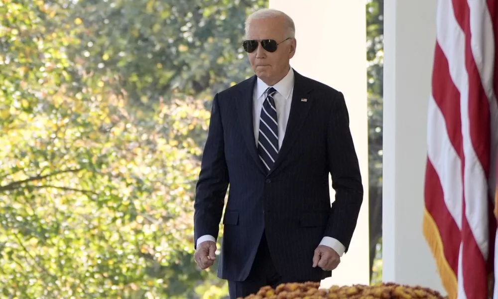 President Joe Biden walks to speak in the Rose Garden of the White House in Washington, Thursday, Nov. 7, 2024. (AP Photo/Mark Schiefelbein)