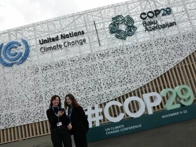 Kiki Ritmeijer and Sarah Nasrawi, both U.N. Youth Representative on Sustainable Development from the Netherlands, pose for a selfie outside the venue ahead of the United Nations climate change conference, known as COP29, in Baku, Azerbaijan November 10, 2024. REUTERS/Murad Sezer