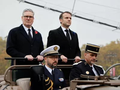 France's President Emmanuel Macron and Britain's Prime Minister Keir Starmer arrive at Place de l'Etoile to attend commemorations marking the 106th anniversary of the November 11, 1918, Armistice, ending World War I, in Paris, on November 11, 2024.   Ludovic Marin/Pool via REUTERS