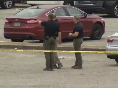 This image taken from video provided by WSFA shows law enforcement at the scene of a shooting at Tuskegee University, Sunday, Nov. 10, 2024, in Tuskegee, Ala. (WSFA via AP)