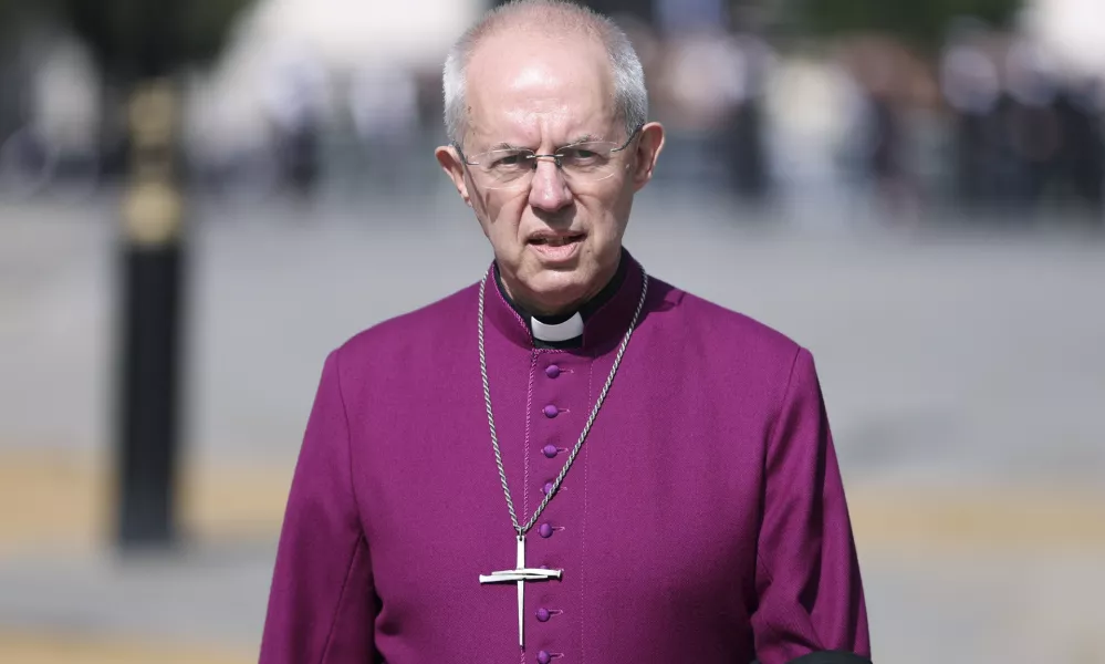 FILE - The Archbishop of Canterbury Justin Welby walks through Westminster in London on Sept. 14, 2022. (Richard Heathcote/Pool Photo via AP, File)