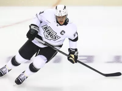 Nov 11, 2024; Calgary, Alberta, CAN; Los Angeles Kings center Anze Kopitar (11) skates during the warmup period against the Calgary Flames at Scotiabank Saddledome. Mandatory Credit: Sergei Belski-Imagn Images