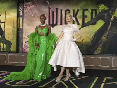 FILE - Cynthia Erivo, left, and Ariana Grande arrive at the premiere of "Wicked" on Nov. 9, 2024, at Dorothy Chandler Pavilion in Los Angeles. (Photo by Jordan Strauss/Invision/AP, File)