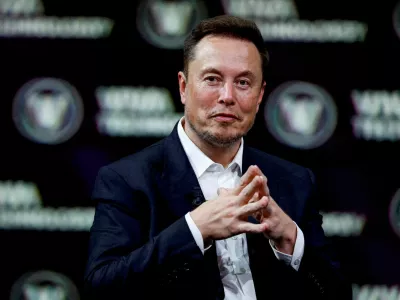 FILE PHOTO: Chief Executive Officer of SpaceX and Tesla and owner of Twitter, gestures as he attends the Viva Technology conference dedicated to innovation and startups at the Porte de Versailles exhibition centre in Paris, France, June 16, 2023. REUTERS/Gonzalo Fuentes/File Photo