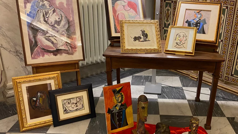 Modern and contemporary fake artworks, including Banksy, Pablo Picasso and Andy Warhol, are displayed following an Italian Carabinieri operation against a large-scale pan-European forgery network, in Pisa, Italy, November 9, 2024. Carabinieri/Handout via REUTERS  THIS IMAGE HAS BEEN SUPPLIED BY A THIRD PARTY