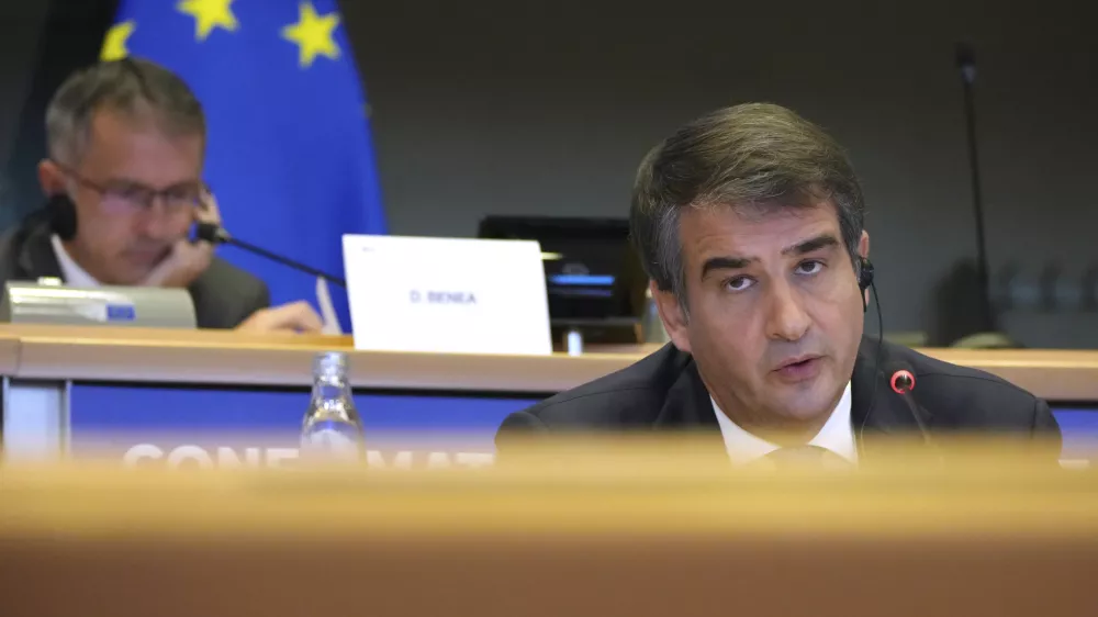 Italy's Raffaele Fitto, nominee for European Commissioner Executive Vice-President for Cohesion and Reforms, speaks during his hearing at the European Parliament in Brussels on Tuesday, Nov. 12, 2024. (AP Photo/Virginia Mayo)