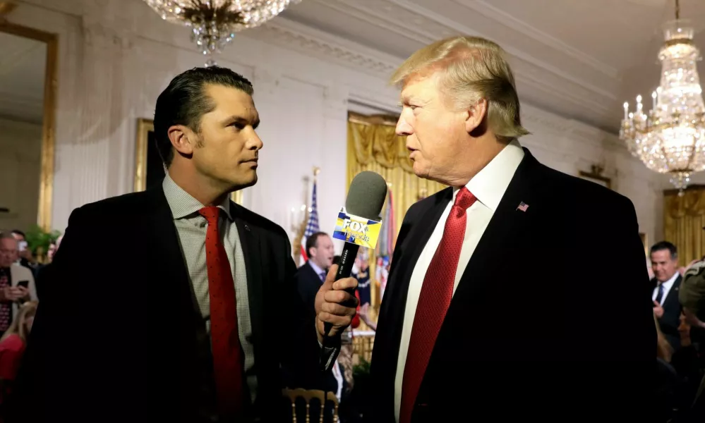 FILE PHOTO: U.S. President Donald Trump is interviewed by Fox and Friends co-host Pete Hegseth at the White House in Washington, U.S. April 6, 2017. REUTERS/Kevin Lamarque/File Photo