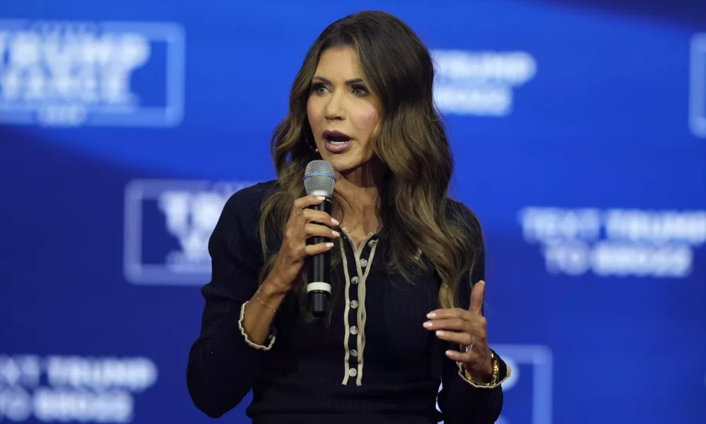 FILE - South Dakota Gov. Kristi Noem speaks before Republican presidential nominee former President Donald Trump at a campaign town hall, Oct. 14, 2024, in Oaks, Pa. (AP Photo/Matt Rourke, File)