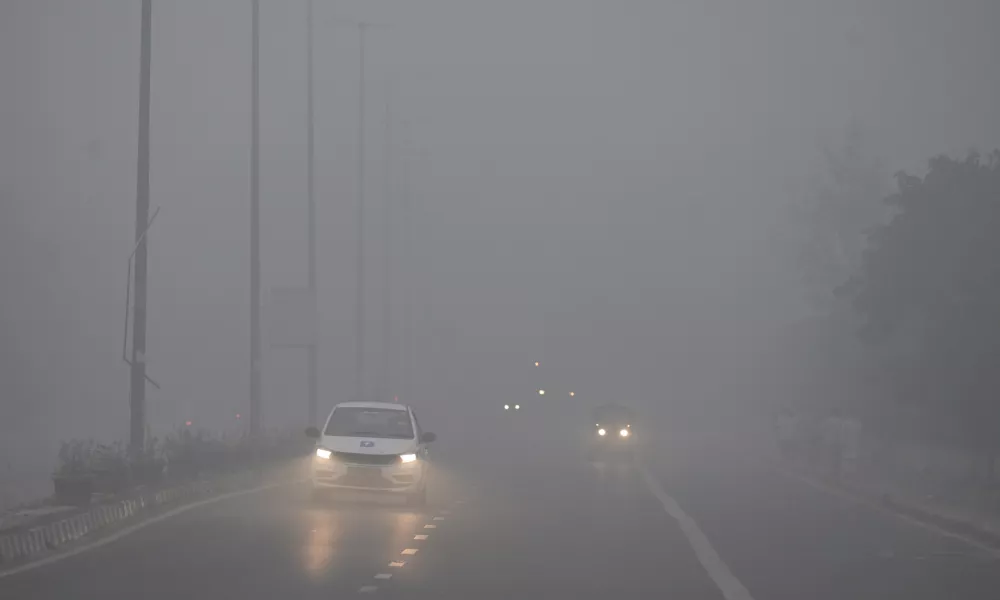 Motorists drive amidst a dense layer of smog as the air quality index indicates 'severe' category early morning in New Delhi, India, Wednesday, Nov.13, 2024. (AP Photo)