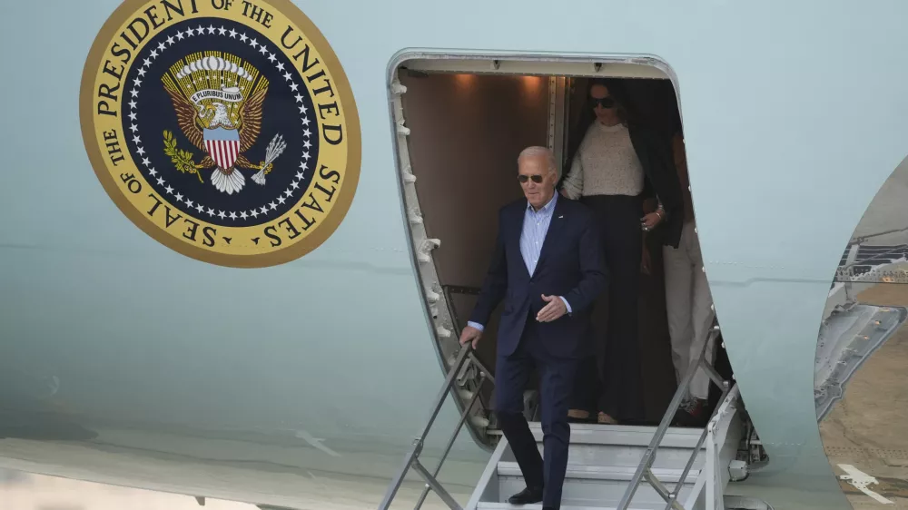 U.S. President Joe Biden deplanes in Lima, Peru, to attend the Asia-Pacific Economic Cooperation (APEC) summit, in Lima, Peru,Thursday, Nov. 14, 2024. (AP Photo/Guadalupe Pardo)