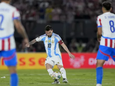 Argentina's Lionel Messi controls the ball during a qualifying soccer match for the FIFA World Cup 2026 against Paraguay in Asuncion, Paraguay, Thursday, Nov. 14, 2024. (AP Photo/Jorge Saenz)