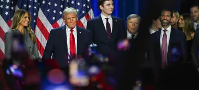 Republican presidential nominee and former U.S. President Donald Trump takes the stage with his wife Melania and his son Barron following early results from the 2024 U.S. presidential election in Palm Beach County Convention Center, in West Palm Beach, Florida, U.S., November 6, 2024. REUTERS/Callaghan O'Hare