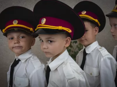 Young cadets get ready for a ceremony in a cadet lyceum on the first day at school in Kyiv, Ukraine, Monday, Sept. 2, 2024. (AP Photo/Efrem Lukatsky)