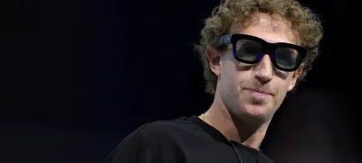 Meta CEO Mark Zuckerberg tries on Orion AR glasses at the Meta Connect annual event at the company's headquarters in Menlo Park, California, U.S., September 25, 2024. REUTERS/Manuel Orbegozo  TPX IMAGES OF THE DAY